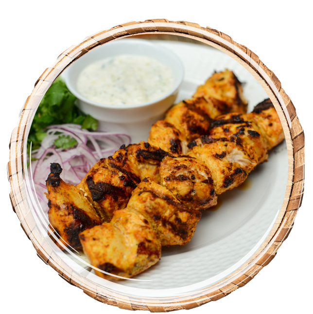 Tender boneless chicken marinated in creamy yogurt mixed with red chili paste and lime juice