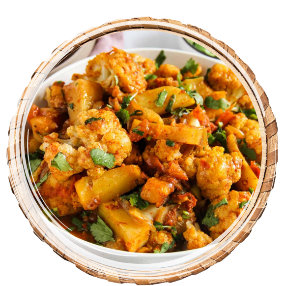 A flavorful dry curry made with potatoes and cauliflower cooked with mixed spices.